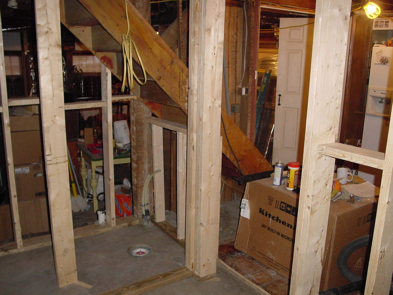 Framing downstairs bath after concrete pour