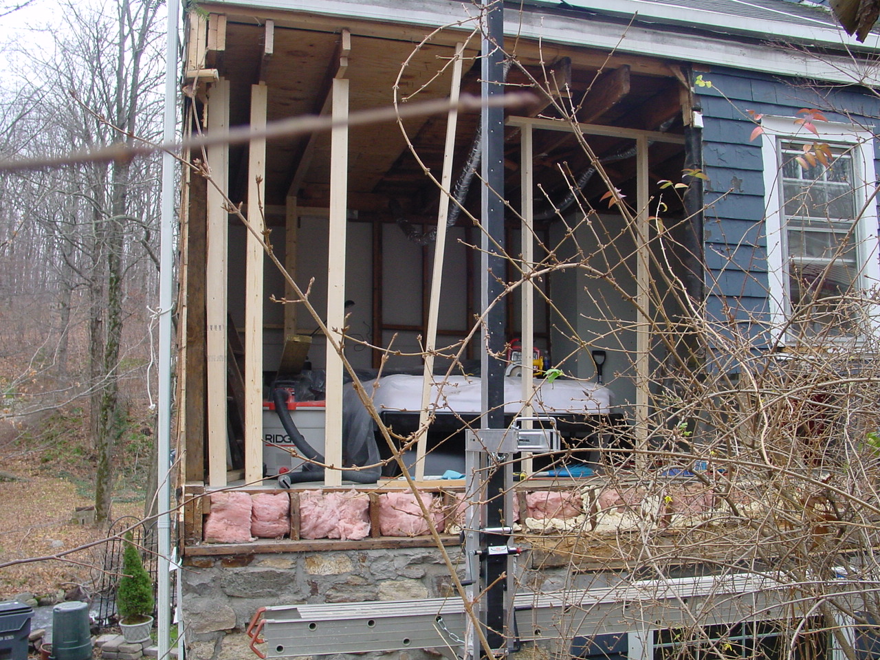 Demo of the wall and old partial sloped ceiling