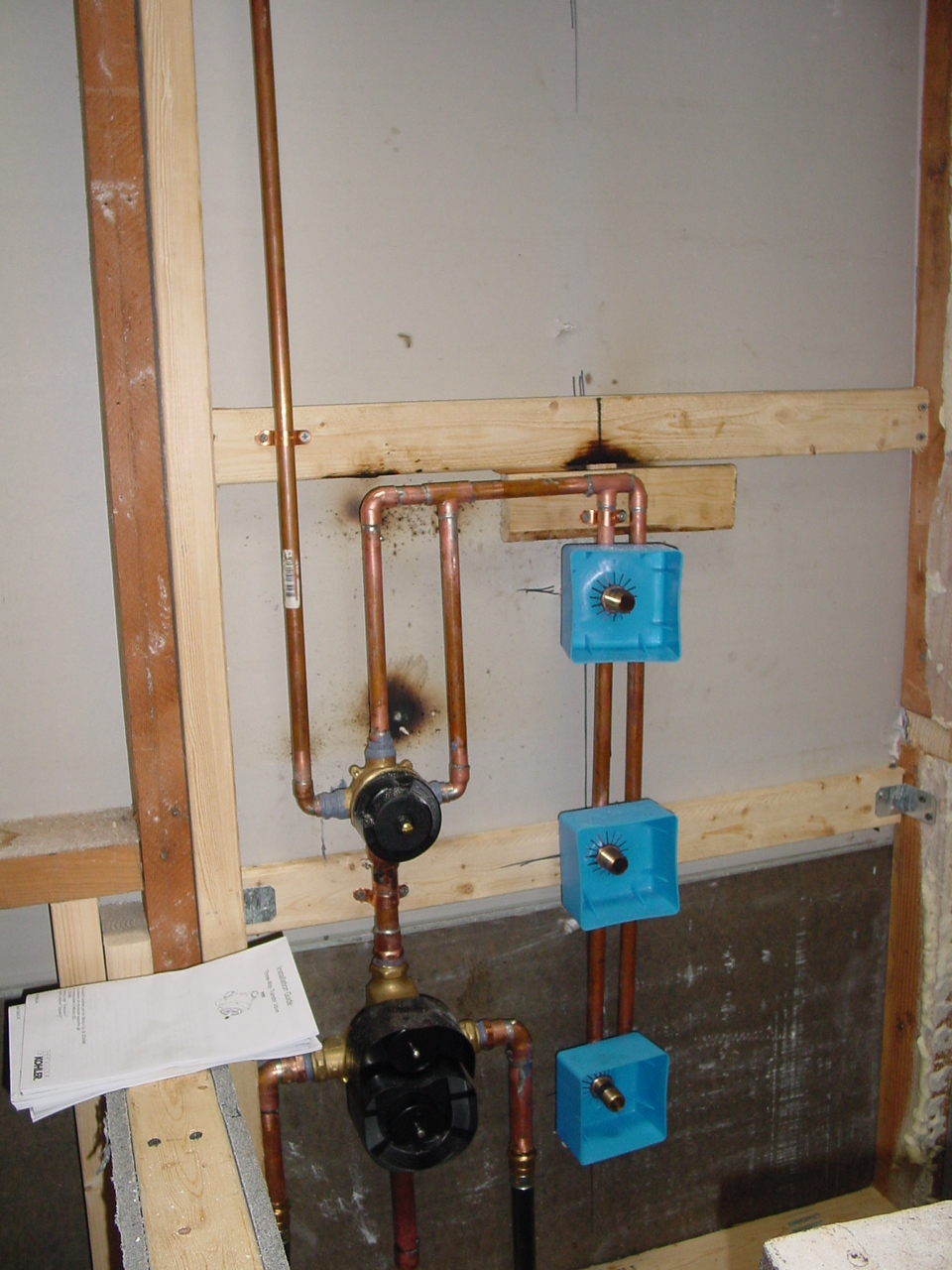 Plumbing for shower water tiles